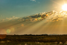 USA, Idaho, Bellevue, Late Sun Creating God Rays Over Rural Landscape