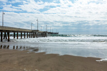 USA, California, Venice, Waves Cresting Under Pier