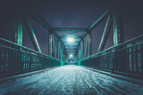 Fototapeta Fototapety z mostem - Nowoczesny żelazny most w nocy zimą. Most im. Heleny Sendlerowej w Opolu