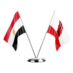 Two table flags isolated on white background 3d illustration, egypt and gibraltar