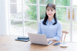 © kapinon - Asian women playing computers smiling at the camera, easy to use for recruiting and hiring.