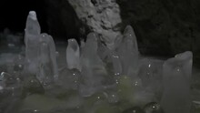 Ice Stalagmites Inside The Cave. Close Up View