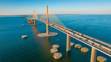 Wall Mural - Sunshine Skyway Bridge spanning the Lower Tampa Bay and connecting Terra Ceia to St. Petersburg, Florida, USA. Day photo. Ocean or Gulf of Mexico seascape. Reinforced concrete bridge structure.