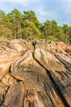 Rock Formations In Beautiful Sunlight At A Forest