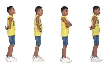 Wall Mural - group of the same boy from the side view  dressed in shorts sleeveless on white background