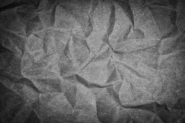Poster - black crumpled paper texture background,be crush paper for creased and wrinkled for texture backdrop from shockproof paper