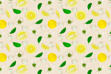 Fototapeta  - Fresh organic yellow lemon fruit summer seamless pattern with green leaves and chamomile on pastel background.