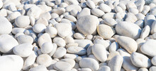 Small Stone Texture Background. Pattern Of White Gray Smooth Seaside Pebbles. Top View