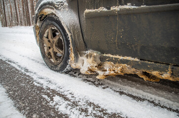 car wheel in mud, ice and snow