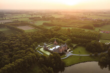 Aerial View Of Ooidonk Castle During Sunset, Situated Near Gent, Belgium.