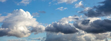 Rain Clouds On Blue Sky Background. Fluffy Cumulus Cloudscape White And Grey Shade Color.