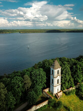 Aerial View Of Pazaislis Monastery Belfry And Kaunas Lagoon With Sailboat, Kaunas, Lithuania.