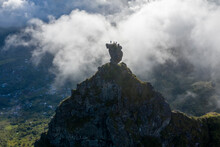 Aerial View Of Three People Standing At Pieter Both, A Mountain Peak For Hikers Near Malenga, Mauritius.