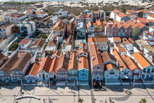 Aerial View Of Costa Nova, A District With Colourful Houses Near Aveiro, Portugal.