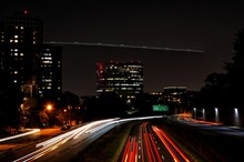 Long Exposure Shot Of Cars On The Road At Night