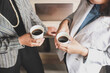 © Scopio - Two businesswomen discussing work over a cup of coffee