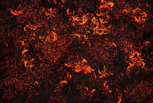 Abstract Light Orange Blaze Fire Flame Glitter Vintage Particles Texture With Fire Spark Pattern On Dark.