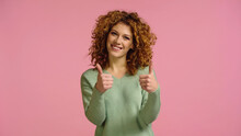 Young And Joyful Woman With Red Hair Showing Thumbs Up Isolated On Pink