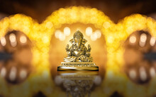 Selective Focus On Statue Of Lord Ganesha, Ganesha Festival. Hindu Religion And Indian Celebration Of Diwali Festival Concept On Dark, Red, Yellow Background.