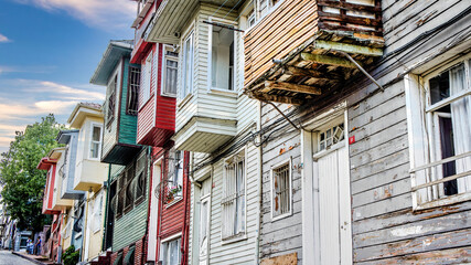 Wall Mural - Istanbul-Turkey - June 2012: Colorful houses of Fener Balat, traditional Jewish quarter in the Fatih district of Istanbul. It is located on the European side of Istanbul by Golden Horn.