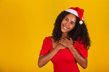Beautiful Afro Woman In Gratitude To Hand In Heart With Santa Hat