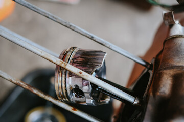 Wall Mural - Damaged piston of a motorcycle engine.