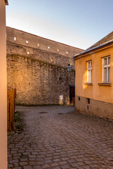 Wall Mural - View of the city of Telc in the winter sunset.
The picturesque castle and the historic center with the decorative facades of the houses belong to the UNESCO World Heritage Site, Czech Republic.