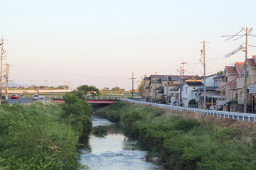 the river and people houses