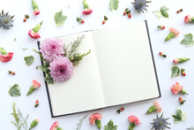 Notebook And Flowers