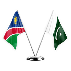 Two table flags isolated on white background 3d illustration, namibia and pakistan