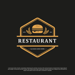 Wall Mural - Vintage burger logo design vector. Burger logo for your brand or product 