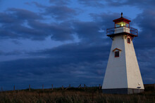 Post Sunset Blue Hour Lighthouse On Cliff