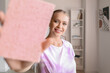 © Pixel-Shot - Young woman with sponge at home