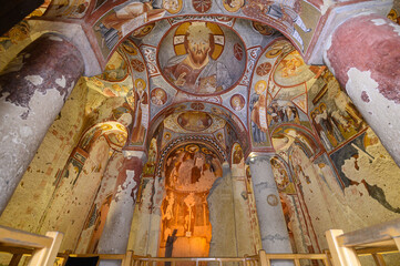 Frescos and murals in ancient cave Apple Church or Elmali Kilise painted in directly onto rock, Goreme, Cappadocia, Turkey