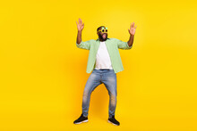 Full Size Photo Of Carefree Positive Man Rejoice Dancing Clubbing Free Time Weekend Isolated On Yellow Color Background