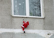 santa claus climbs out the window