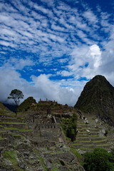 Canvas Print - views of Macchu Picchu through the mist with clouds, Peru