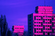 Leinwandbild Motiv Skyscrapers on the sunset - violet grade