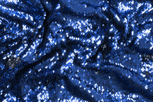 Blue Sequins Festive Background - Abstract Backdrop For Holiday And Party Banner. Glamour Shiny Background With Sequin Texture And Blinking Lights. Sequins Fabric In Blue Color
