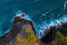 Aerial View Of Waves Crashing Against Cliffs Near Andrea Lodges During Sunset In The South Coast Of Mauritius Island