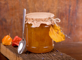 Wall Mural - Homemade Pumpkin puree jam on wooden background