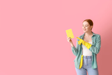 Wall Mural - Young woman with sponge on color background