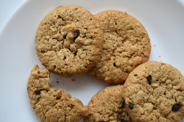 Oatmeal cookies with chocolate on a plate