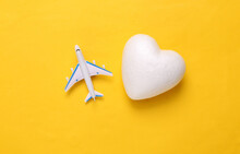 Passenger Plane With Hearts On A Pink Background. Romantic, Love Concept