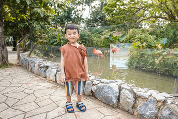 Asian boy visiting the zoo