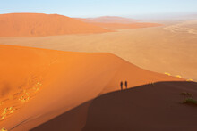Desert Landscape With Shadows Of People, View Of The Dunes Of Sossusvlei, Namibia
