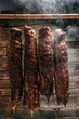 © Надія Коваль - Tasty meats. Traditionally smoked meats pork ham. Traditional method of smoking meat in smoke
