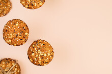 Oatmeal Cookies With Flax, Sunflower And Sesame Seeds On Nude Color Wallpaper With Copy Space For Text. Healthy Fitness Food Concept. Milk And Homemade Cookies For Breakfast