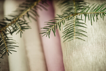 set of fabric with christmas tree branch close-up