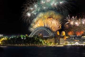 Wall Mural - Sydney Harbour Bridge New Years Eve fireworks, colourful NYE fire works lighting the night skies with vivid multi colours